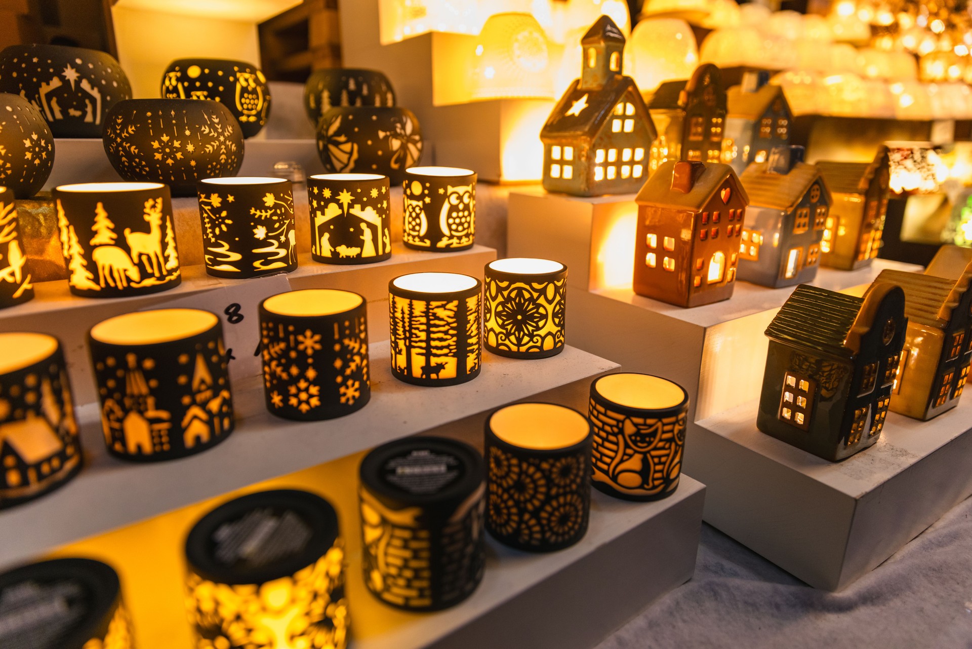 Exquisite Golden Candle Holders and Festive Decorations Illuminating the Christmas Market