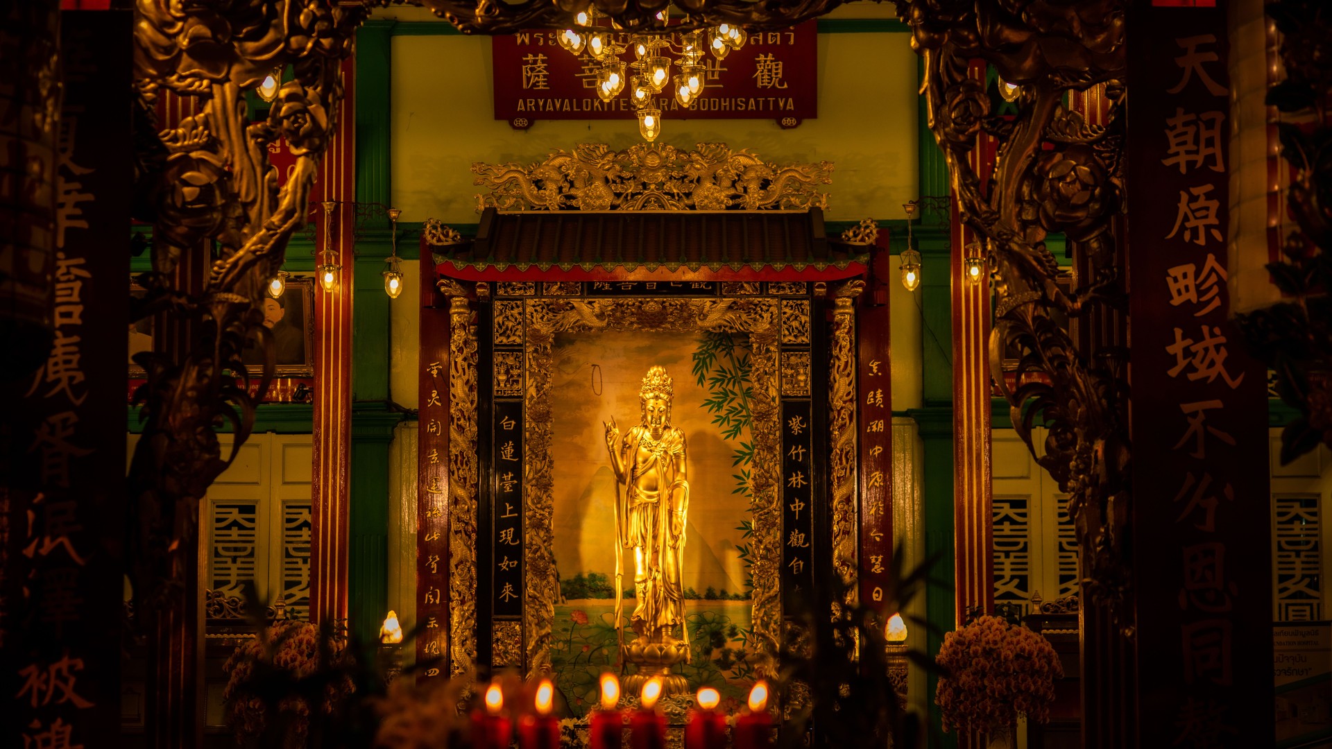 Statue In Illuminated Temple At Night